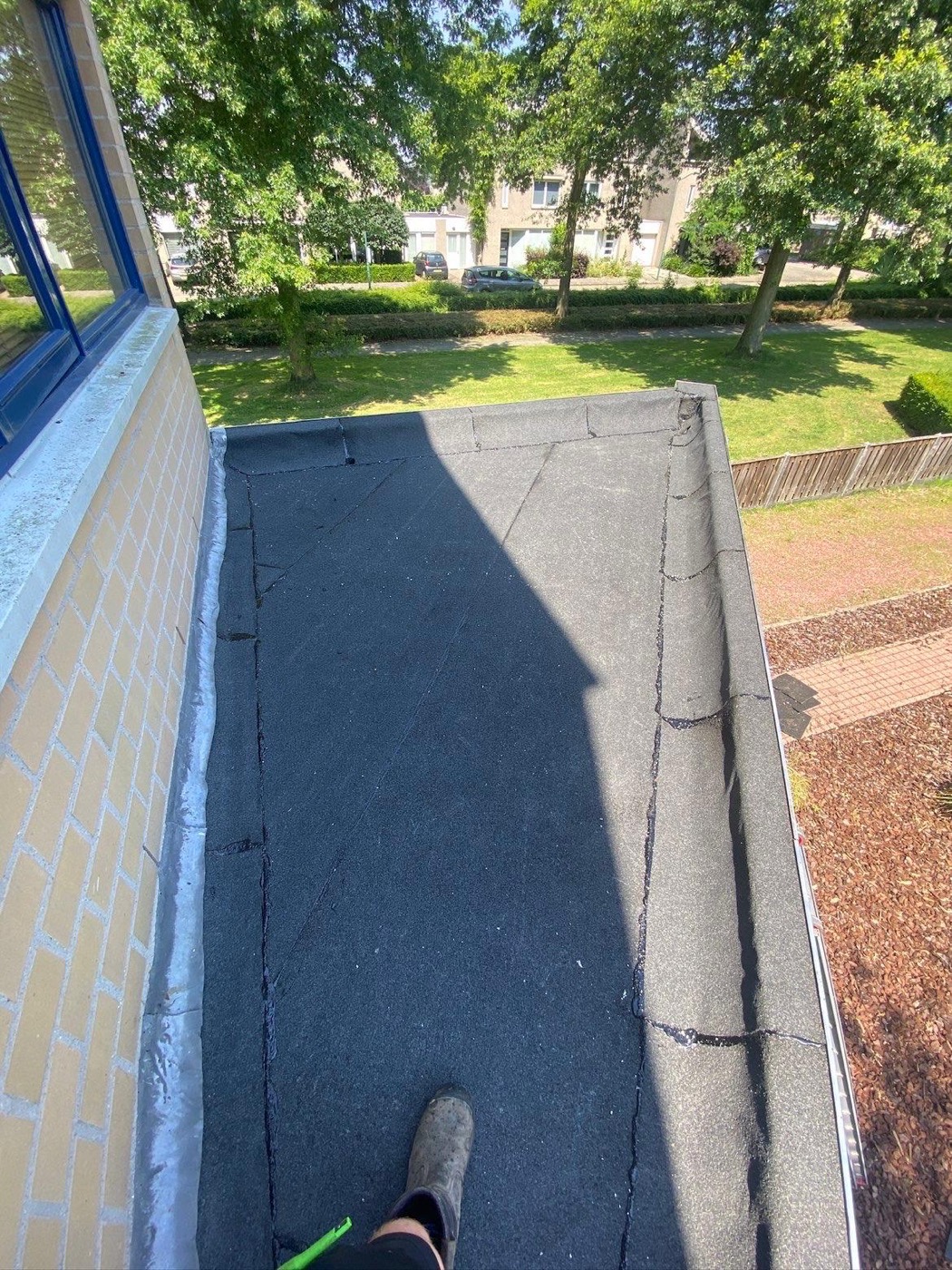 Bitumen dakbedekking op dakkapel
